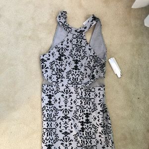 Blue and black dress with leg slit and mesh cutout